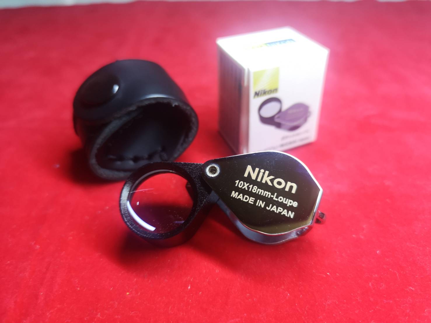 กล้องส่องพระ/ส่องเพรช Nikon สีเงิน เลนส์แก้วสองชั้น 10x18mm แถมฟรีซองหนังวัวแท้ตรงรุ่น ราคา 390 บาท*ส่งฟรี