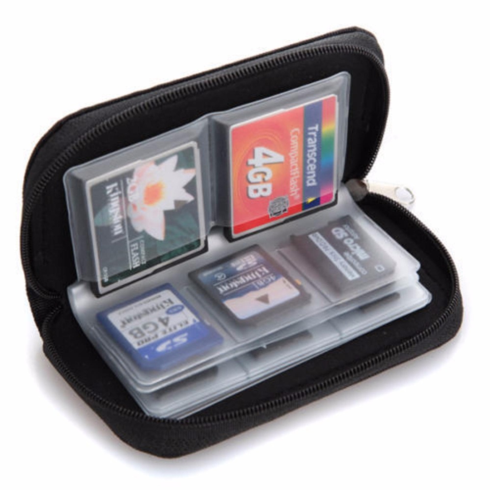 WOW กระเป๋าเก็บเมมโมรี่การ์ด สำหรับ CF, SD หรือ Micro SD cardมีช่องทั้งหมด 22 ช่อง (สีดำ) WOW กระเป๋าเก็บเมมโมรี่การ์ด สำหรับ CF, SD หรือ Micro SD cardมีช่องทั้งหมด 22 ช่อง (สีดำ)