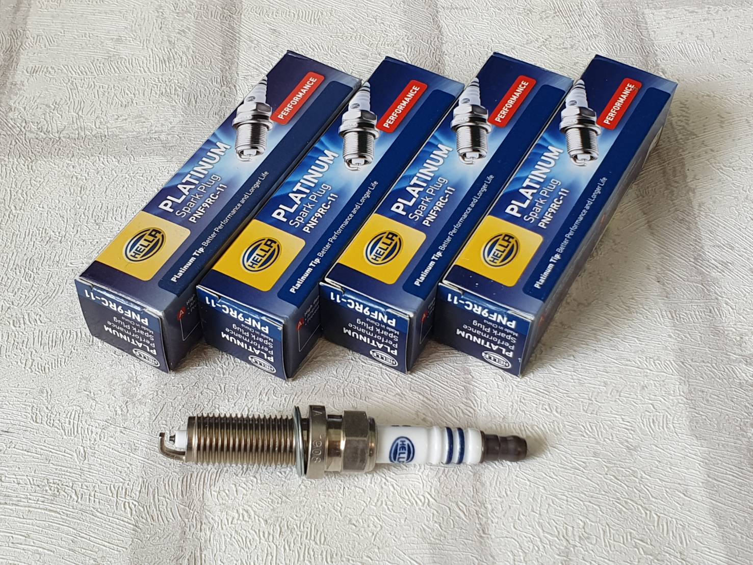 หัวเทียน Nissan Navara D40 ( 2004 - 2014 ) รุ่น 2.5 ชุด 4 หัว ชนิดแพลทตินัม ระยะการใช้งาน 60,000 กม Platinum Type Spark Plug Hella PNF9RC-11 ราคา 875 บาท*ส่งฟรี