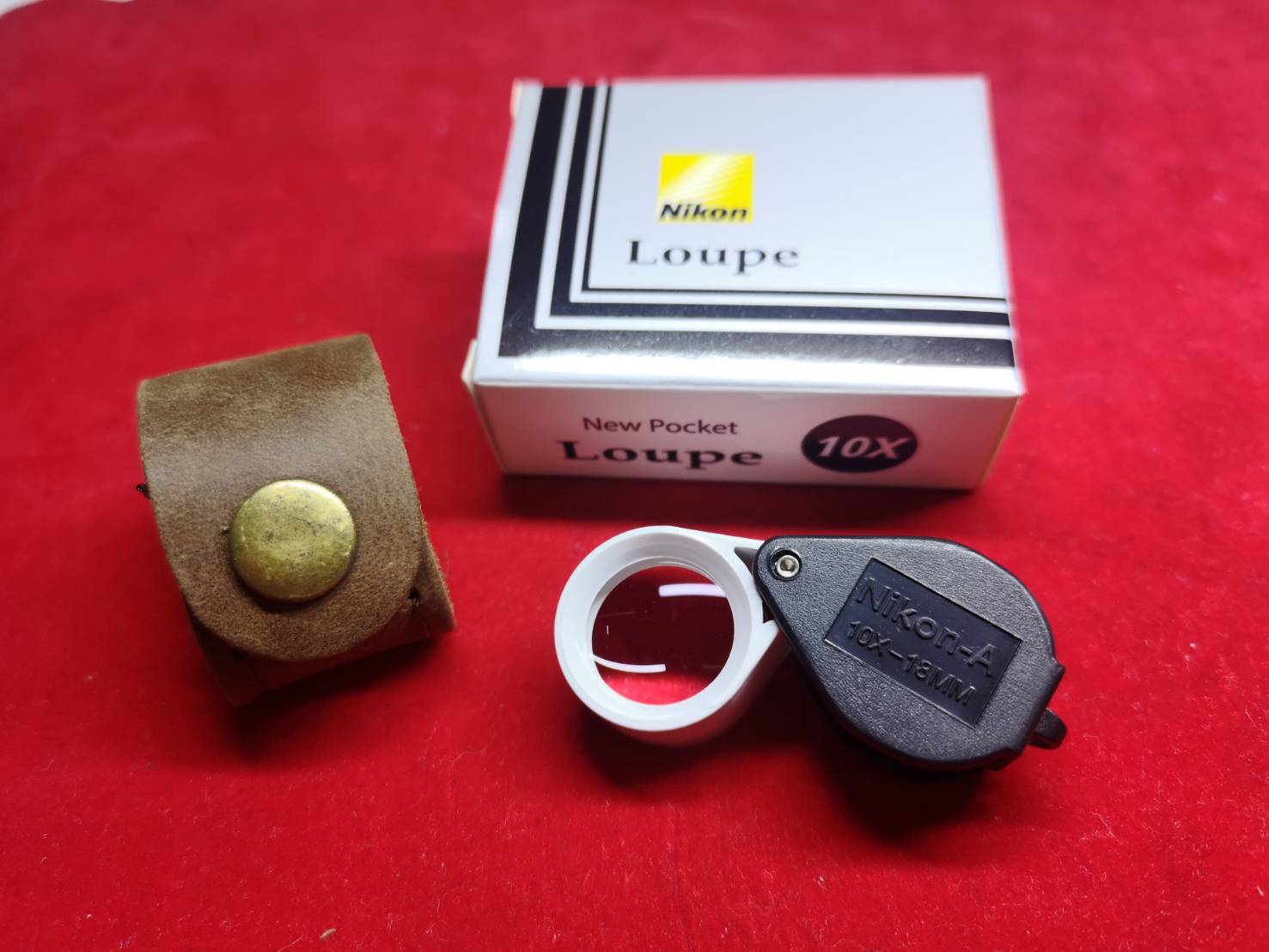 Nikon Loupe 10 X Japan สีขาว เลนส์แก้วสามชั้น ส่องชัดสบายตา แถมฟรีซองหนัง ราคา 380 บาท*ส่งฟรี