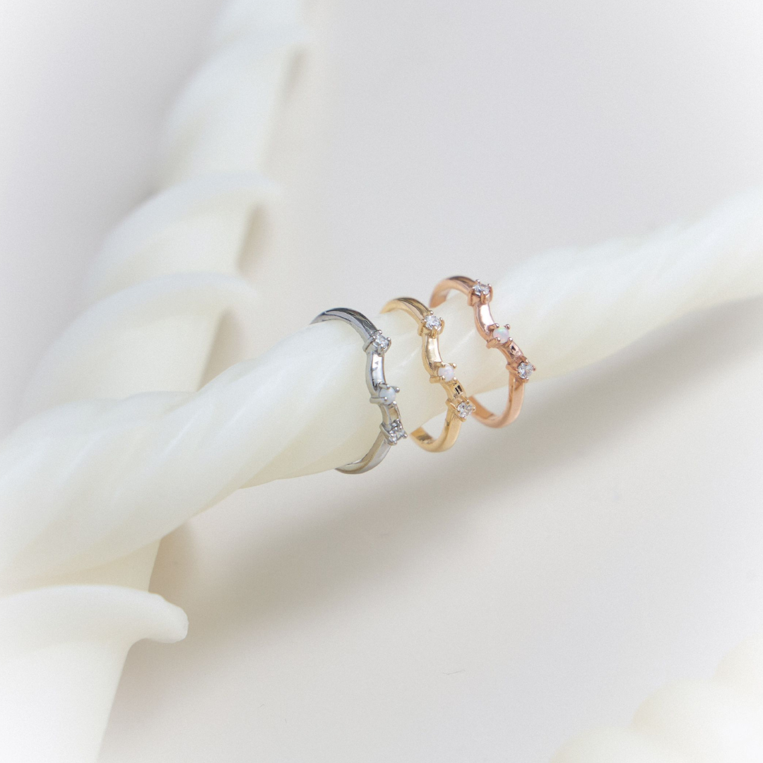 Earika.Earrings - Snowy Sway Ring, Wave-Shaped Ring Made of Opal Gemstone, Stainless Steel Material, Suitable for People with Sensitive Skin. ราคา 380 บาท*ส่งฟรี