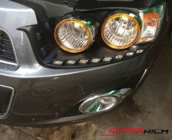 TFP ครอบไฟหน้าโครเมี่ยม แต่งอะคริลิคสีส้ม (Head Lamp Cover) / Chevrolet Sonic (5Drs.) TFP ครอบไฟหน้าโครเมี่ยม แต่งอะคริลิคสีส้ม (Head Lamp Cover) / Chevrolet Sonic (5Drs.)