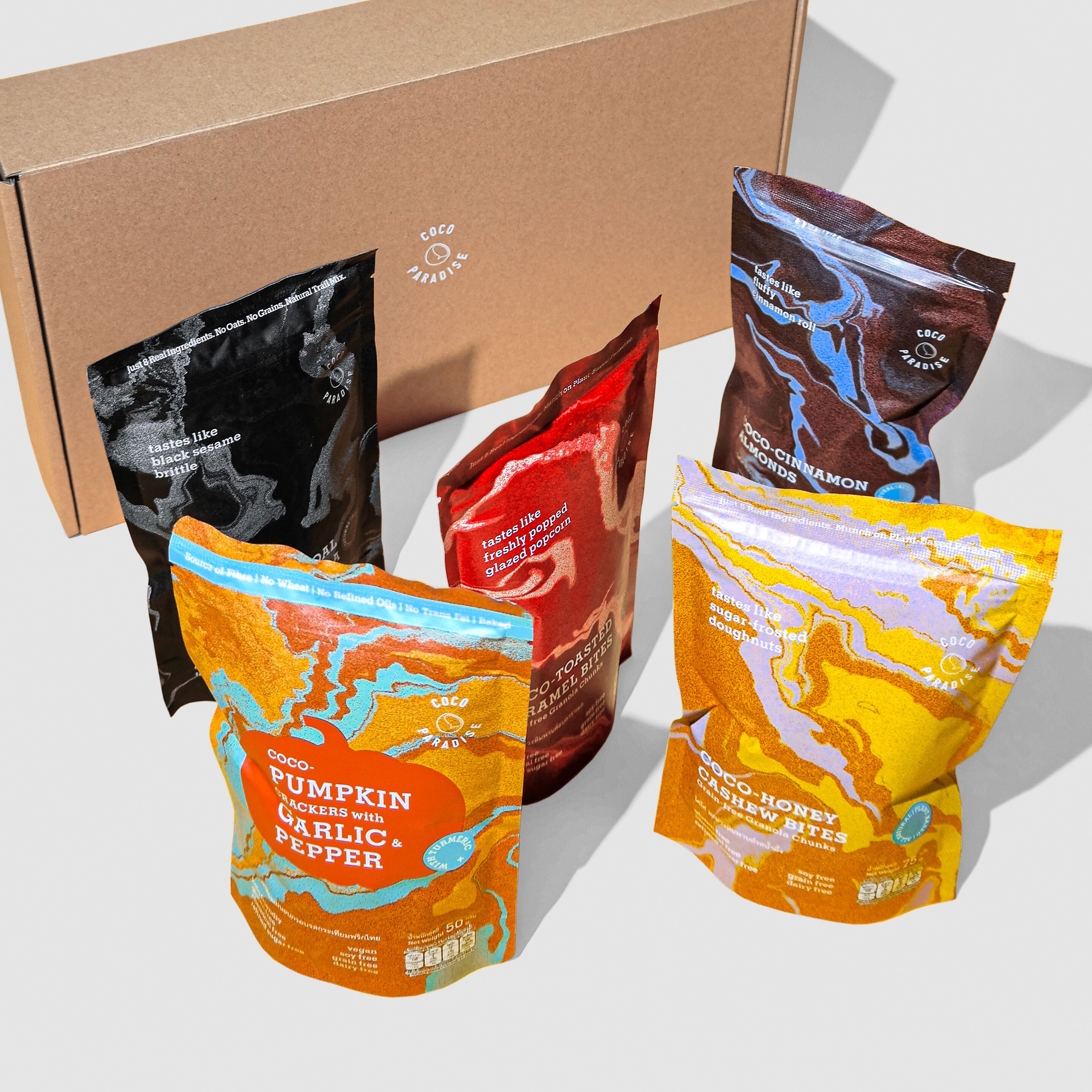 Cocoparadise All Natural Snacks Set (5 Flavours) - Cinnamon Almond / Honey cashew bite / Toasted caramel bite / Pumpkin cracker / Granola charcoal ราคา 560 บาท*ส่งฟรี