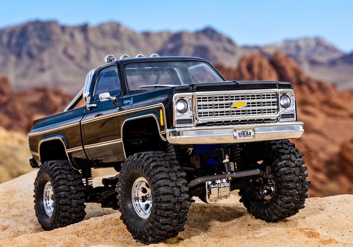 รถบังคับไฟฟ้า TRAXXAS TRX-4M™ Chevrolet® K10 High Trail 1/18 มอเตอร์ Titan® 180 87-turn ระบบคลิปล็อคบอดี้แบบใหม่ ซ่อนด้านใน สวยสมจริงให้แกรถบังคับ ราคา 8,900 บาท*ส่งฟรี