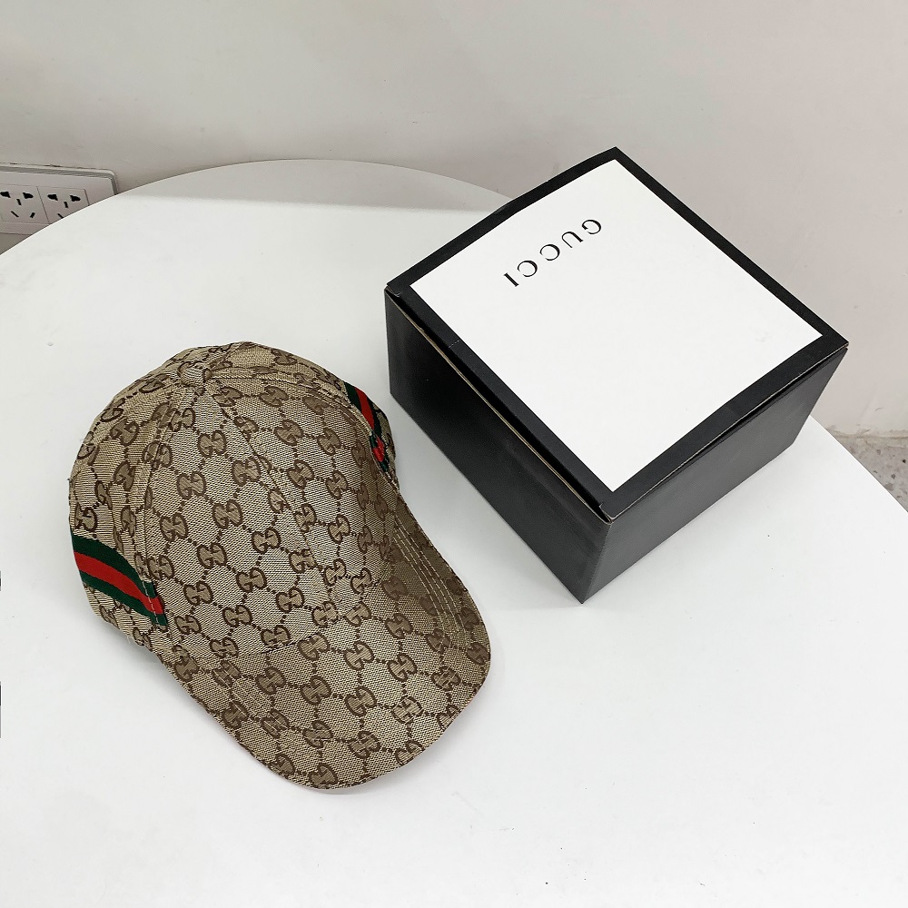 หมวกแก๊ป แฟชั่น Gucci กุชชี เนื้อผ้าดี งานคุณภาพดี 100% ใส่ง่าย สะดวกสบาย หมวกแก๊ป หมวกแก็ปผู้ชาย หมวกแก๊ปผู้หญิง หมวกกันแดด (พร้อมกล่อง)