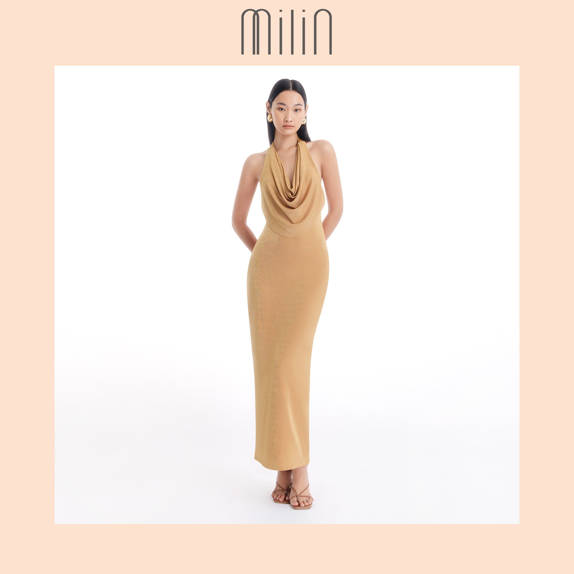 [MILIN] Body-conscious draped halter neck open back with Milin crystal M logo Midi dress เดรสกึ่งยาวทรงเข้ารูปคอถ่วงคล้องคอจับจีบเปิดหลังแต่งด้วยโลโก้คริสตัลตัว M / Poised Dress 42 ราคา 5,948 บาท*ส่งฟรี