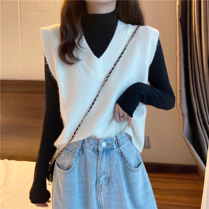 เสื้อกันหนาวเสื้อกั๊กคอวีสีขาวฤดูใบไม้ร่วงผู้หญิงใหม่ 2020 รุ่นเกาหลีหลวมแขนกุดด้านนอกด้านบน