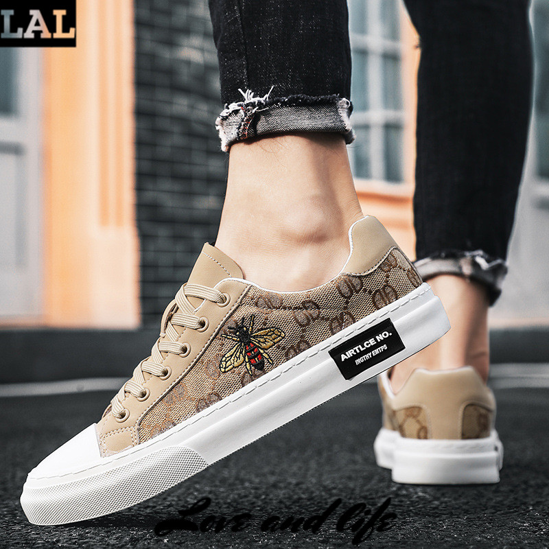 LAL men's shoes, knitted casual shoes, Korean version running shoes, light fashion shoes, sneakers men ราคา 462 บาท*ส่งฟรี