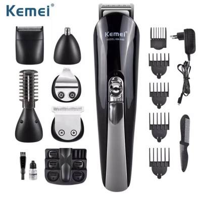 Kemei SUPER GROOMING KIT 11in1 ชุดเครื่องจัดแต่งทรงผม ปัตตาเลี่ยน ชาร์ตไฟได้ เครื่องโกนหนวด ตัดขนจมูก ตัดผมสั้น ที่ตัดผมไฟฟ้า เครื่องตัดผม ตัดขน บัตตาเลี่ยน โกนผม โกนขน แบตตาเลี่ยน แบบไร้สาย ตัดผมเด็ก ชุดบัดตาเลียน ใบมีดโลหะชนิดพิเศษ (KM 600)