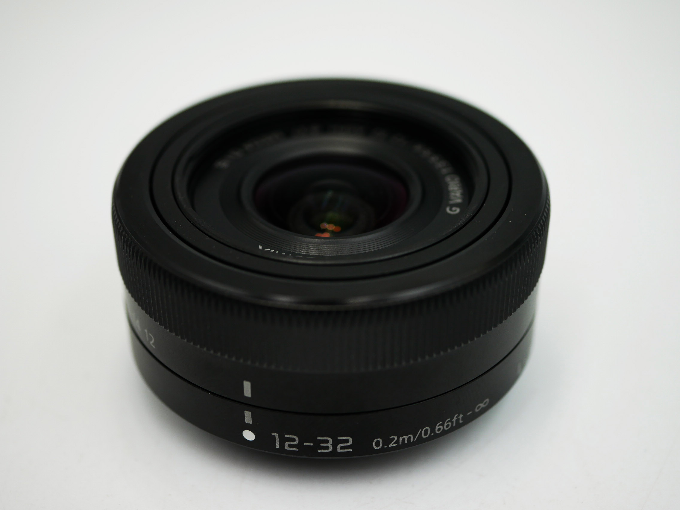Panasonic Lumix G 12-32mm F/3.5-5.6 Vario Mega OIS Lens Black G Vario ASPH. Mega O.I.S., H-FS12032 stepping AF motor and internal focus design are also employed for quick, quiet focusing performance, 24-64mm eq. slim, retractable form factor, used ราคา 3,880 บาท*ส่งฟรี