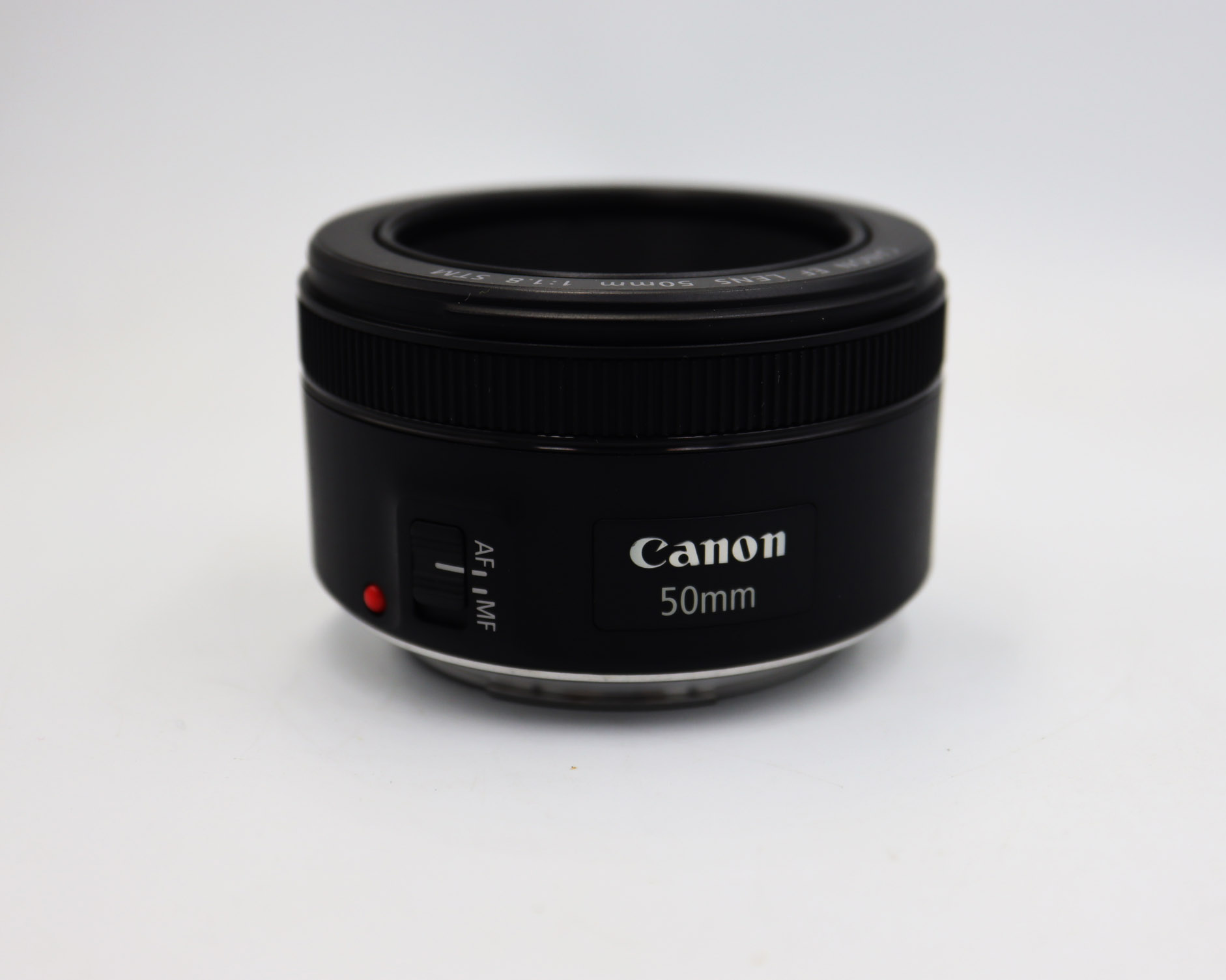 Canon EF 50mm f/1.8 STM AutoFocus Prime Lens 50mm f1.8, 80mm eq., stepping motor (gear-type STM) APS-C and full-frame cameras, excellent prime lens for portraits, action, even nighttime photography, continuous Movie Servo AF for movies, used ราคา 3,390 บาท*ส่งฟรี
