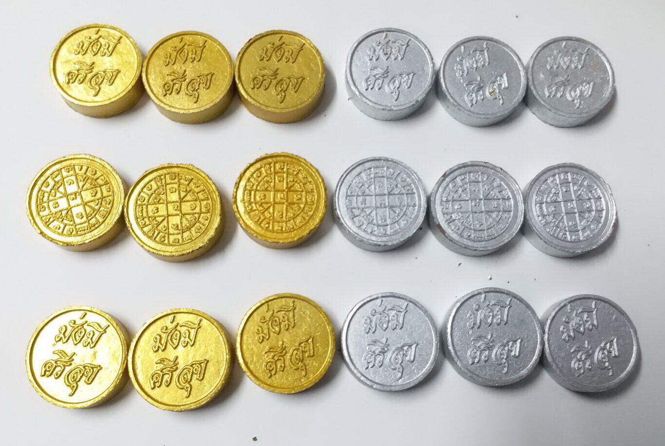 มุมมองเพิ่มเติมของสินค้า เหรียญเงิน เหรียญทอง มวลสาร 9 อย่าง ลงเสาเอก เสาโท เหรียญเงิน 9 เหรียญ + เหรียญทอง 9 เหรียญ(แถมเหรียญเงินเหรียญทองอย่างละ 1 เหรียญ)