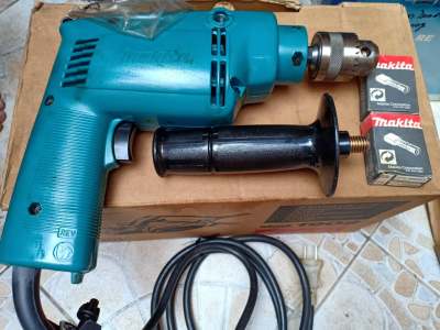ดูภาพ สว่านไฟฟ้าElectric drill brand Makita Japan รุ่น NHP 1010schklongthom1992 เพิ่มเติม สว่านไฟฟ้าElectric drill brand Makita Japan รุ่น NHP 1010schklongthom1992